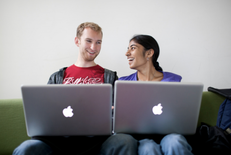 two people with computers